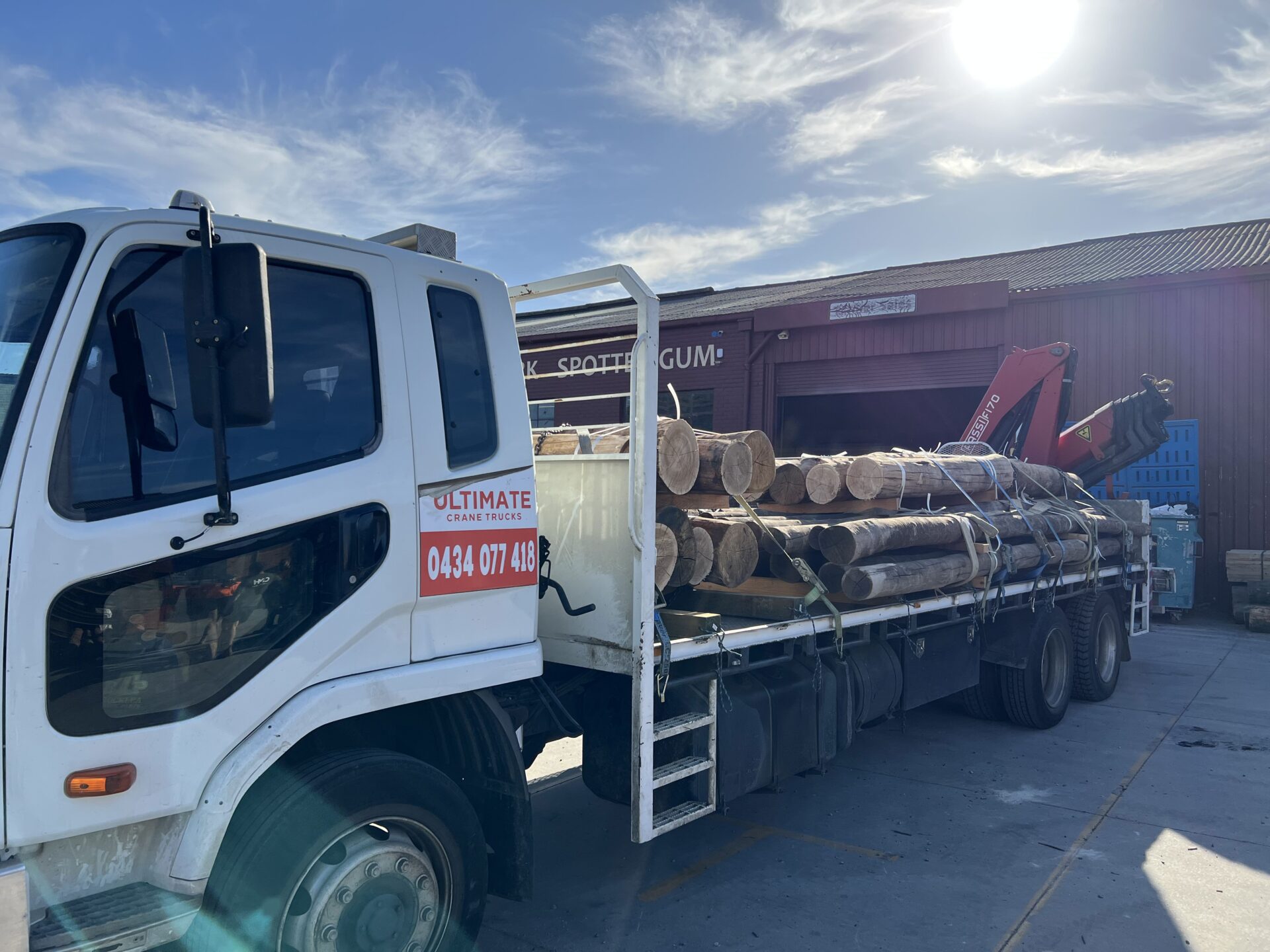 Crane truck services support tree transplanting and landscaping by enabling precise lifting, transport, and placement.