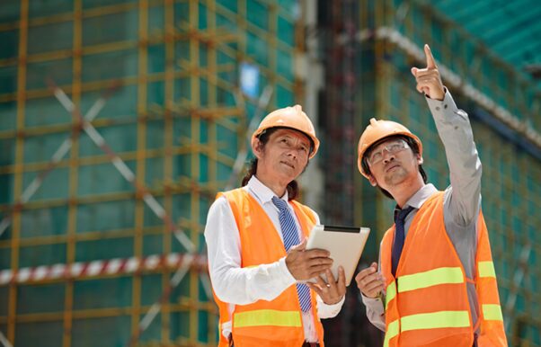 Before you rent a crane truck, safety engineers assess your lift zone for ground stability, overhead hazards, and site-specific risks to ensure safe and compliant lifting. Credit: https://www.freepik.com/free-photo/discussing-project_5633749.htm#fromView=search&page=3&position=0&uuid=3f719654-6ecc-46a6-8f10-586a254434ae&query=+Safety+Engineer